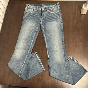 Women’s silver bootcut jeans size 28/35
Aiko
